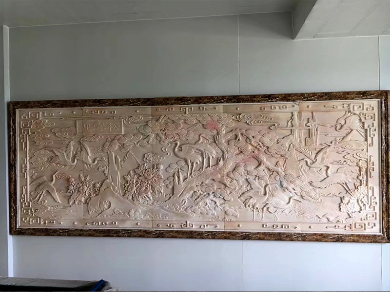 晚霞红石雕壁画